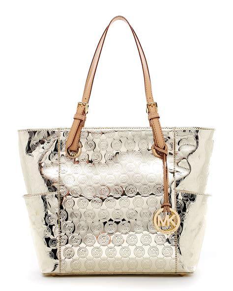 michael kors logo jet set metallic logo|Michael Kors monogram jet set.